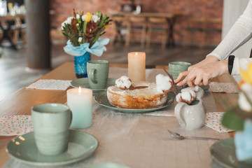 Background with cups and apple cake. tea party. charlotte pie. Table with flowers with copy space.