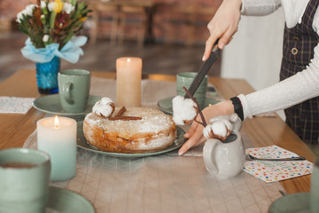 Background with cups and apple cake. tea party. charlotte pie. Table with flowers with copy space.