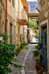 Fototapeta na wymiar A quiet street in an old village of Pano Lefkara. Larnaca District, Cyprus.