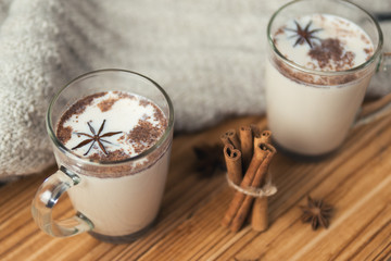 masala tea with cinnamon and anise on wooden background