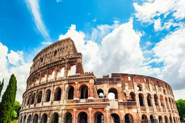 Fototapeta na wymiar Coliseum in Rome, Italy. Famous tourist landmark