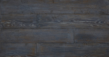 parquet from solid wood. sample of parquet. texture or background. wood texture. board. painted with natural oil. wax. mastic. imitation of valuable species of wood.