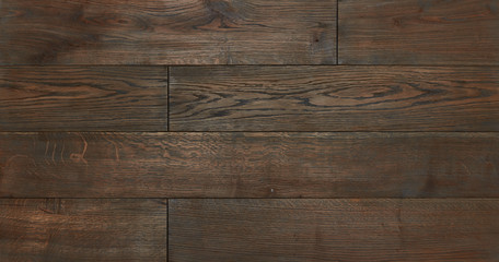 parquet from solid wood. sample of parquet. texture or background. wood texture. board. painted with natural oil. wax. mastic. imitation of valuable species of wood.
