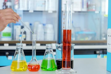 Chemical tube set development and pharmacy in laboratory  with multicolored substances in laboratory - Image