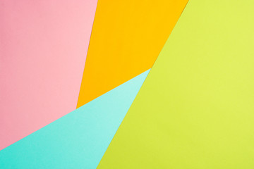 texture background of fashionable pastel color with top view, minimal concept, flat lay: blue, orange, green and pink