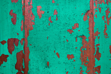 old painted rusty metal surface with corrosion traces for texture or background