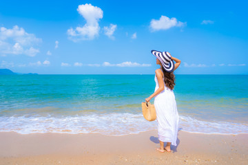 Portrait beautiful young asian woman happy smile leisure on the beach sea and ocean