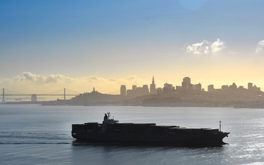 Fototapeta premium San Francisco Bay City Skyline and Boat Silhouette