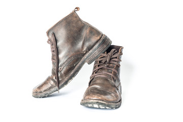 Old leather boots On a white background