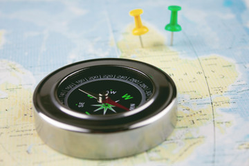 compass and map on the table