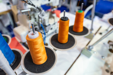 Multicolored spools of thread.