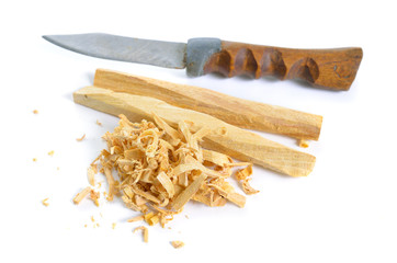 Palo santo, Holy Wood sticks with handmade knife isolated on white background.
