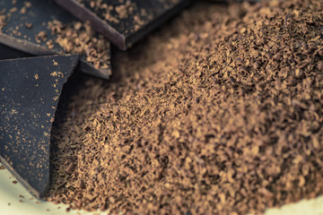 Heap of grated chocolate closeup