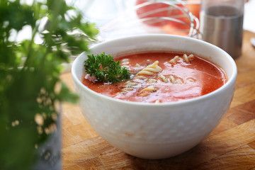 Home-made tasty tomato soup with noodles.