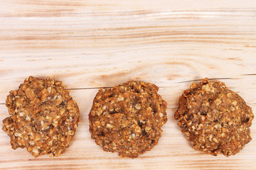 Oat biscuits in detail on wooden background
