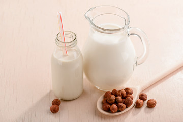Bottle and jug of milk