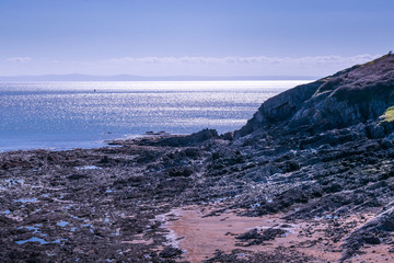 Dramatic rocky coastline in Swansea, Wales