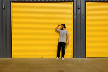 man standing at warehouse door