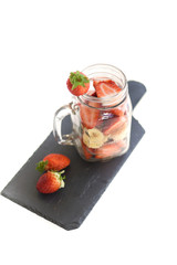 Jar with strawberries and banana