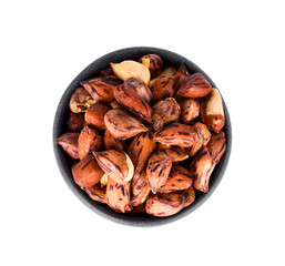 Nuts in bowl isolated on white background
