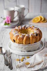 Easter bread with oranges and raisins, apple blossom. Russian kulich paska, polish babka sweteczna.