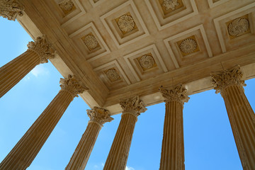 Maison Carree, antique Roman temple over blue sky