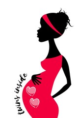 Silhouette of enceinte woman with two hearts in multiple pregnancy