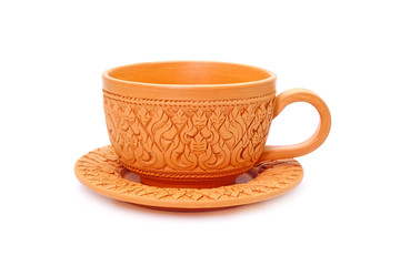Coffee cup : Thai traditional style earthenware coffee cup Isolated on white background. Beautiful coffee cup from Thailand, famous carved earthenware. Handmade pottery.