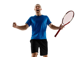 Portrait of a handsome male tennis player celebrating his success isolated on a white studio...