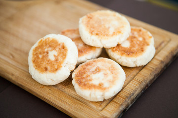 Cream cheese fritters on the wood plank