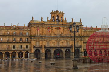 Fototapeta premium Salamanca, Spain-January 01, 2017:View of main square. Ancient Plaza Mayor. The square is furnished in the style of Spanish Baroque and framed by restaurants, ice-cream shops, souvenir shops