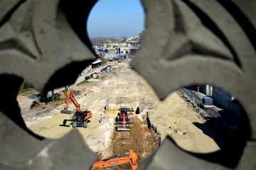 worker cutting a pipe with grinder