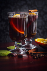 Mulled Wine with pistachio cookies, orange and dark chocolate