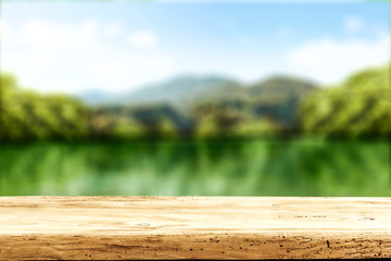 Desk of free space for your decoration and spring blurred background 