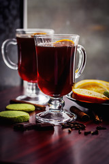 Mulled Wine with pistachio cookies, orange and dark chocolate