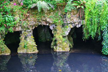Pond and grotto in Quinta da Regaleira Park, Sintra, Portugal