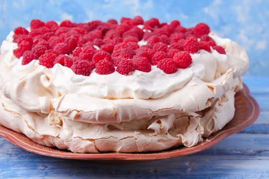 Pavlova Cake With Raspberries And Whipped Cream