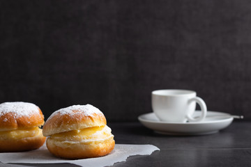 Berlin donuts with coffee in the background