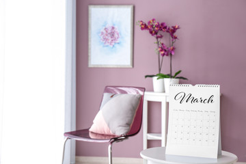 Flip calendar on table in room