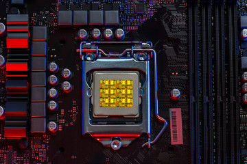 desktop six core processor 9th gen on background motherboard closeup top view, Red and Blue color light
