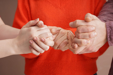 Group of people holding hands together. Concept of unity