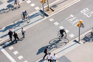 People crossing street Cycling and Walking Traffic sign Smart city Urban lifestyle outdoor - obrazy, fototapety, plakaty