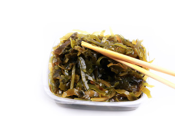 seaweed salad isolated on white background.