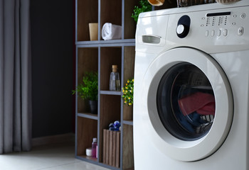Washing machine in modern home laundry room