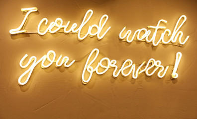 Neon sign on wall
