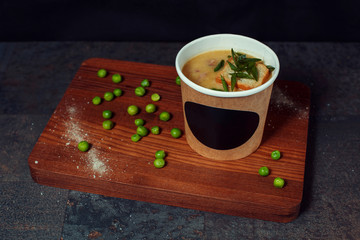 Pea soup in a paper cup