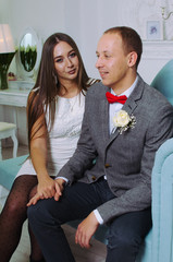 portrait of young people. girl with boyfriend flirting. photography Studio