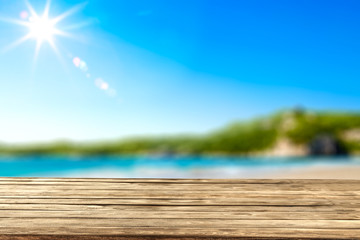 Desk of free space and summer sea landscape 