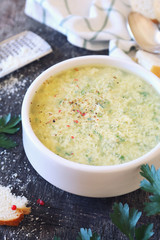 Italian food. Stracciatella soup: parsley, eggs and parmesan cheese