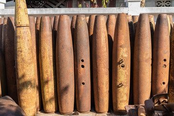 Rusty metal bomb casings and defused unexploded ordnance found in Phonsavan, Xieng Khouang Province, Laos.